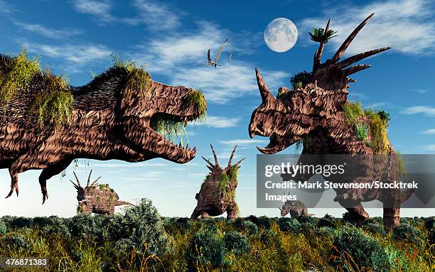 styracosaurus and tyrannosaurus rex dinosaur sculptures. - styracosaurus stock illustrations