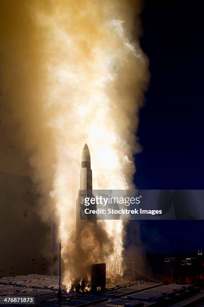 a standard missile-3 is launched from uss lake erie. - uss lake erie cg 70 stock pictures, royalty-free photos & images