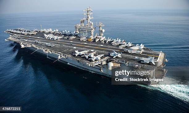 arabian gulf, august 13, 2013 - the aircraft carrier uss nimitz (cvn-68) is underway in the arabian gulf. - us navy stock pictures, royalty-free photos & images