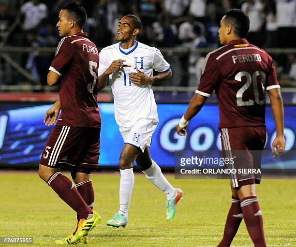 Honduras' Jerri Bengtson celebrates after scoring against Venezuela during their FIFA friendly match at the Olimpico Metropolitano stadium in San...