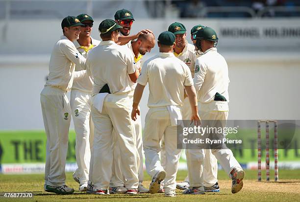 Nathan Lyon of Australia celebrates after taking the wicket of Darren Bravo of West Indies during day two of the Second Test match between Australia...