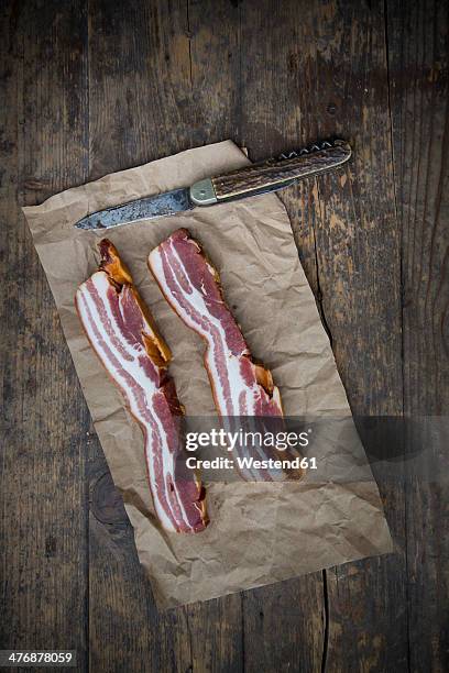 slices of streaky bacon - raw bacon stock pictures, royalty-free photos & images