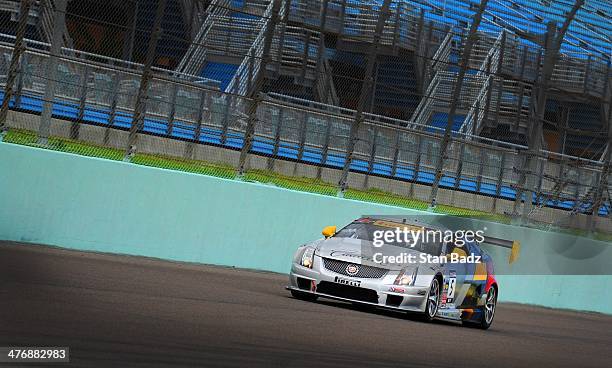 Participates ride along in the Cadillac V-Series Challenge driving experience at the Homestead-Miami Speedway for the World Golf...