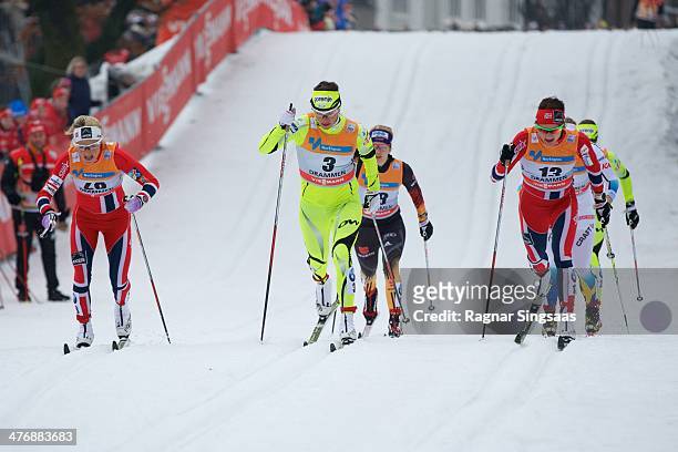 Therese Johaug of Norway, Katja Visnar of Slovenia and Maiken Caspersen Falla of Norway in action during the Women's 1,3km free Sprint Classic...