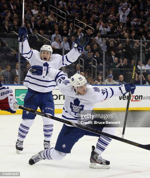 Tyler Bozak of the Toronto Maple Leafs scores at 1:51 of overtime to defeat the New York Rangers 3-2 at Madison Square Garden on March 5, 2014 in New...