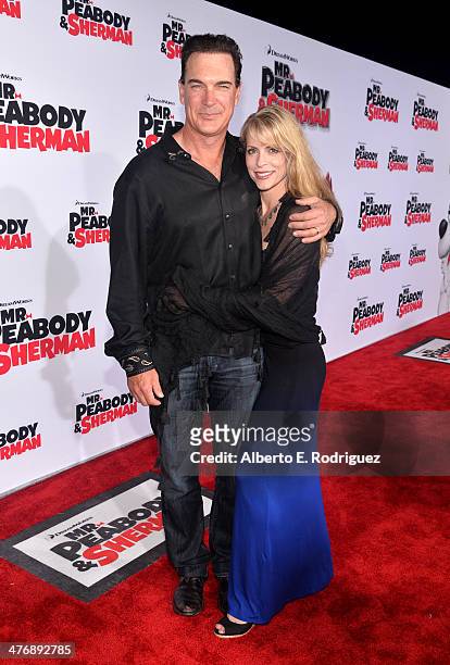 Actor Patrick Warburton and Cathy Jennings attend the premiere of Twentieth Century Fox and DreamWorks Animation's "Mr. Peabody & Sherman" at Regency...