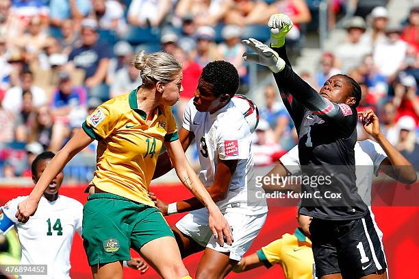 Goalkeeper Precious Dede and Osinachi Ohale of Nigeria defend a corner kick against Alanna Kennedy of Australia during the FIFA Women's World Cup...
