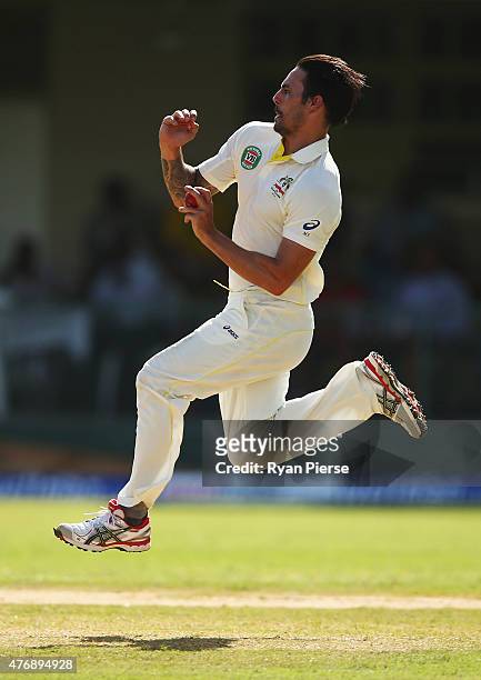 Mitchell Johnson of Australia bowls during day two of the Second Test match between Australia and the West Indies at Sabina Park on June 12, 2015 in...