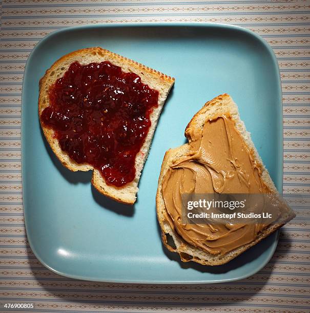 peanut butter and jelly - peanut butter and jelly sandwich stock pictures, royalty-free photos & images