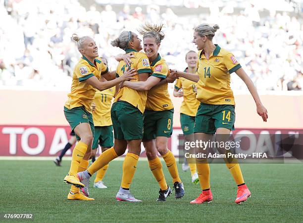 Kyah Simon of Australia is congratulated after scoring her second goal during the Group D match between Australia and Nigeria of the FIFA Women's...