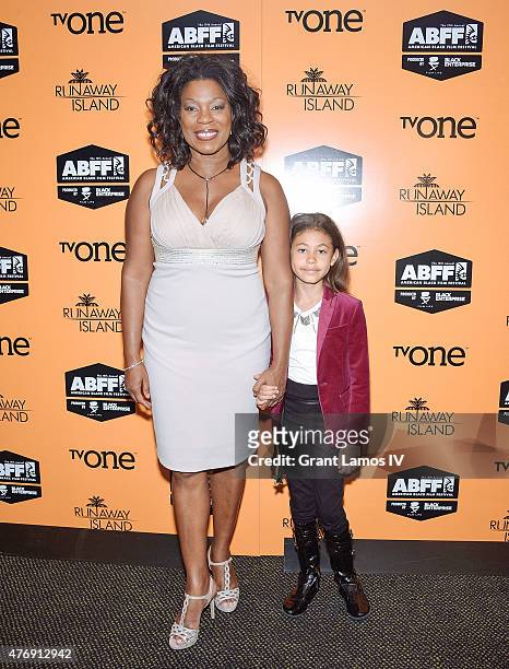 Lorraine Toussaint and her daughter Samara Grace attend the "Runaway Island" Premiere at the 2015 American Black Film Festival at AMC Empire on June...
