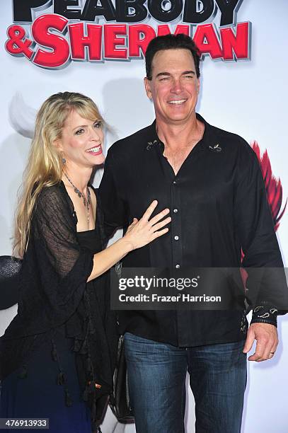 Actor Patrick Warburton and wife Cathy Jennings arrive at the Premiere of Twentieth Century Fox and DreamWorks Animation's "Mr. Peabody & Sherman" at...