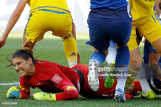 Goalkeeper Hope Solo of the United States reacts after making a save in goal in the first half against Sweden in the FIFA Women's World Cup Canada...