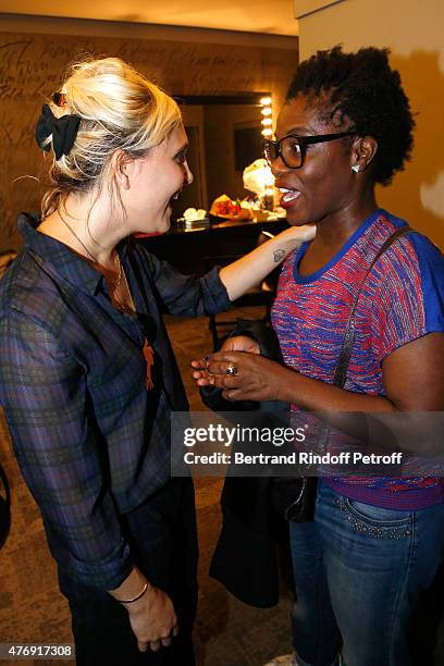 Humorist Berengere Krief poses Backstage with Actress Claudia Tagbo after she Performed at L'Olympia on June 12, 2015 in Paris, France.