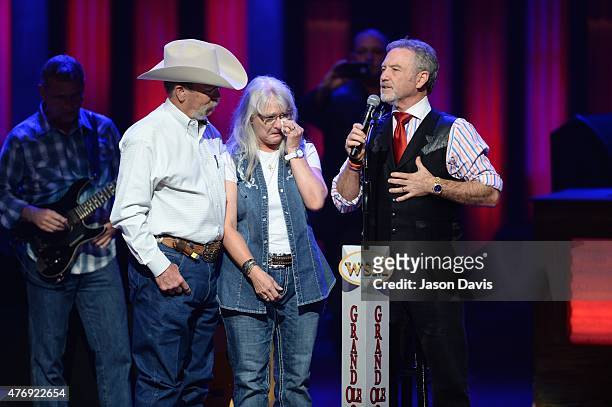 Wayne and Debbie Kyle, parents of U.S. Navy SEAL Chris Kyle make an appearance with Larry Gatlin at The Grand Ole Opry on June 12, 2015 in Nashville,...