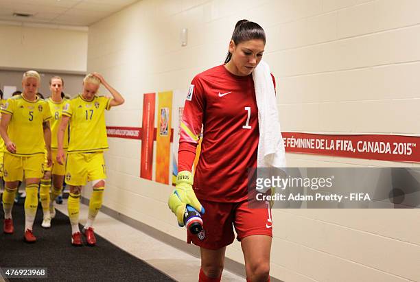 Hope Solo of United States of America walks back to the pitch after half time during the Group D match between United States of America and Sweden of...
