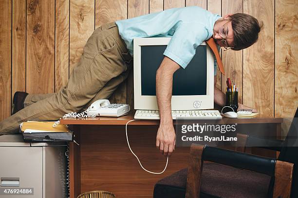 naptime office worker - comic image of man with gun in desert stockfoto's en -beelden