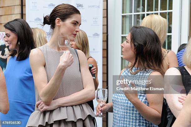 Hilary Rhoda and Samantha Yanks attend as Hamptons Magazine celebrates cover stars Sean Avery and Hilary Rhoda at Barn & Vine on June 12, 2015 in...