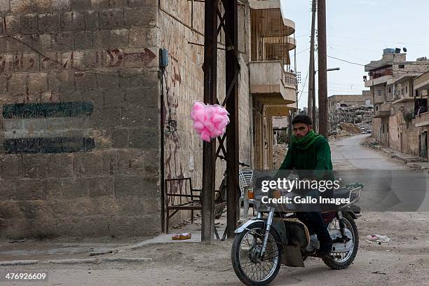 Local commuting on March 1, 2014 in Ma'arat al-Nu'man City, Syria. More than 20 000 people have lost their lives since uprisings boke out in the...