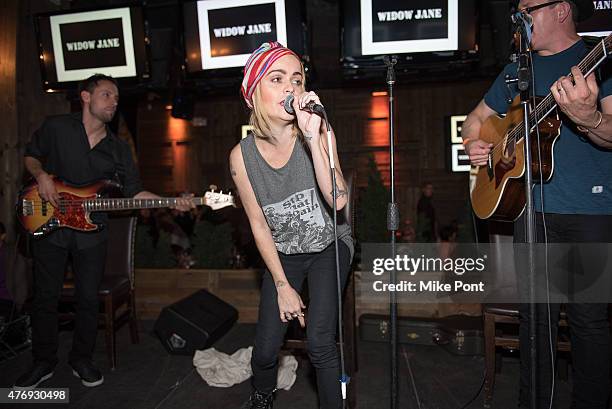 Actress Taryn Manning performs at the "Orange is the New Black" season 3 premiere party benefiting the Women's Prison Association at The Ainsworth on...