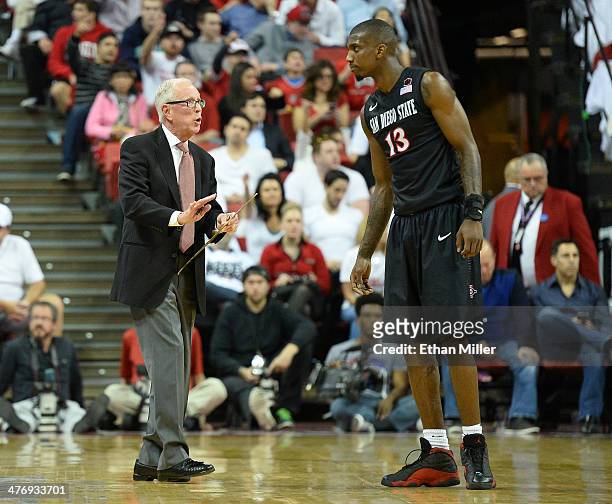 Head coach Steve Fisher of the San Diego State Aztecs talks to Winston Shepard during their game against the UNLV Rebels at the Thomas & Mack Center...