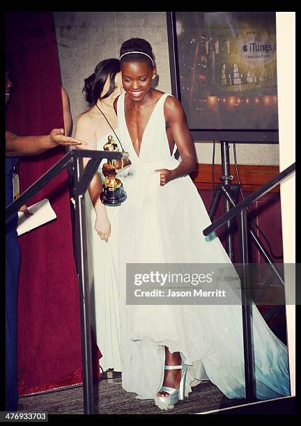 Actress Lupita Nyong'o poses in the press room during the Oscars at Loews Hollywood Hotel on March 2, 2014 in Hollywood, California.