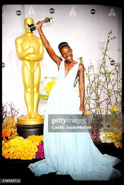 Actress Lupita Nyong'o poses in the press room during the Oscars at Loews Hollywood Hotel on March 2, 2014 in Hollywood, California.