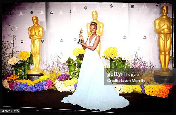 Actress Lupita Nyong'o poses in the press room during the Oscars at Loews Hollywood Hotel on March 2, 2014 in Hollywood, California.
