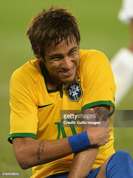 Neymar of Brazil injured during the International Friendly match between South Africa and Brazil at FNB Stadium on March 05, 2014 in Johannesburg,...