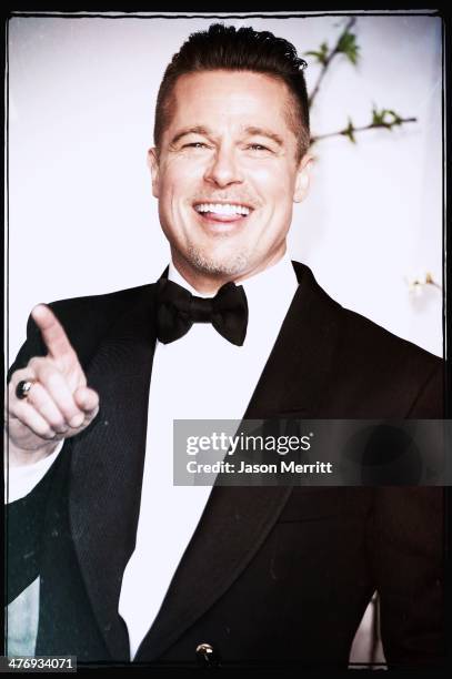 Producer Brad Pitt, winner of Best Picture for '12 Years a Slave', poses in the press room during the Oscars at Loews Hollywood Hotel on March 2,...