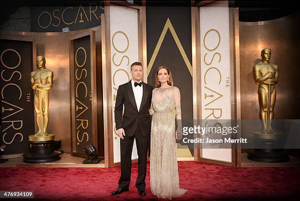 Actors Brad Pitt and Angelina Jolie attend the Oscars held at Hollywood & Highland Center on March 2, 2014 in Hollywood, California.