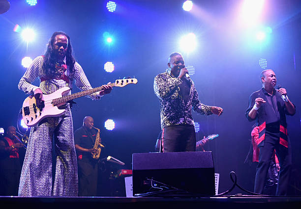 Musicians Verdine White, Philip Bailey and Ralph Johnson of Earth, Wind & Fire perform onstage at Which Stage during Day 2 of the 2015 Bonnaroo Music...