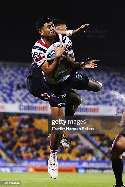 Daniel Tupou of the Roosters catches the high ball during the round 14 NRL match between the New Zealand Warriors and the Sydney Roosters at Mt Smart...