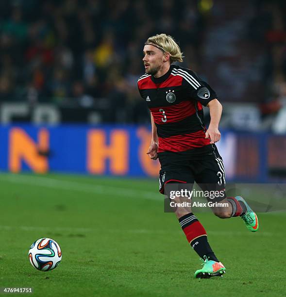 Marcel Schmelzer of Germany controles the ball during the international friendly match between Germany and Chile at Mercedes-Benz Arena on March 5,...
