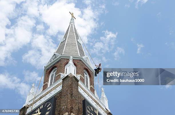 painting a church steeple - steeple stock pictures, royalty-free photos & images