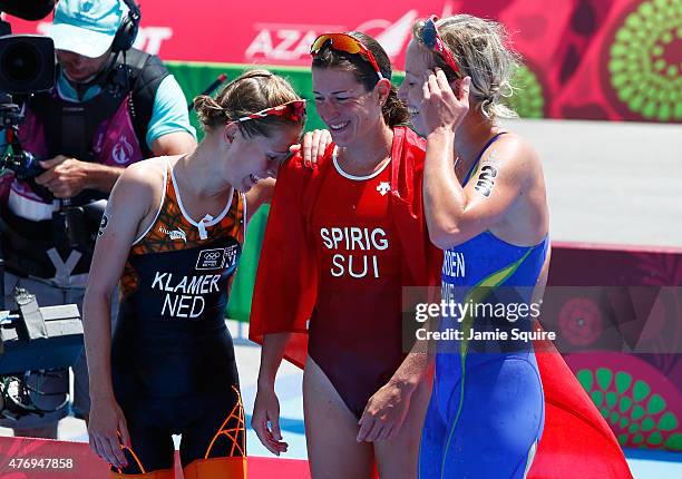 Silver medalist Rachel Klamer of Netherlands, gold medalist Nicola Spirig of Switzerland and bronze medalist Lisa Norden of Sweden celebrate...