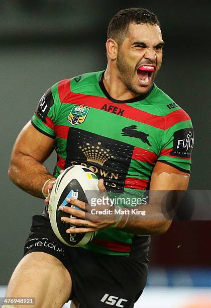 Greg Inglis of the Rabbitohs celebrates scoring his second try during the round one NRL match between the South Sydney Rabbitohs and the Sydney...