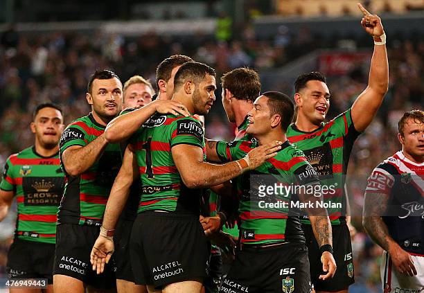 Gerg Inglis and Issac Luke of the Rabbitohs celebrate a try by Inglis during the round one NRL match between the South Sydney Rabbitohs and the...