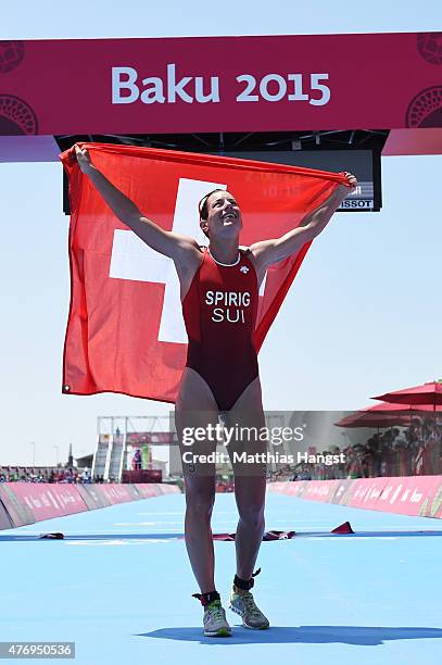 Nicola Spirig of Switzerland celebrates after winning the gold medal in the Women's Triathlon Final during day one of the Baku 2015 European Games at...