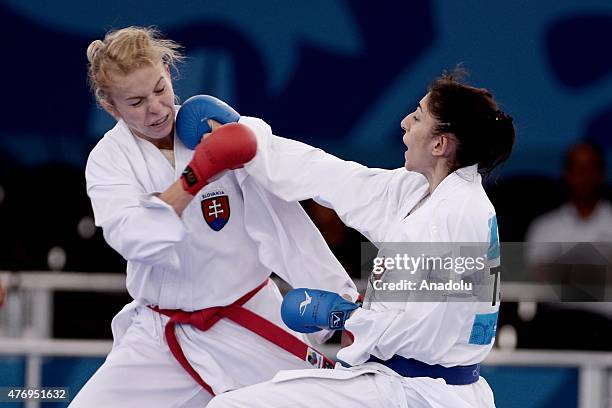 Merve Coban of Turkey and Ingrida Suchankova of Slovakia compete during women's 61kg class karate competition within Baku 2015 - 1st European Games...