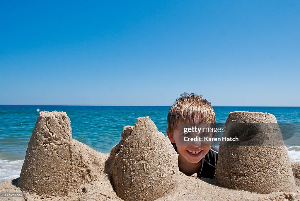 A Boy and His Sandcastle