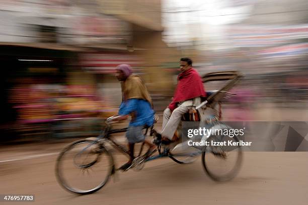 varanasi blurred street scenes, india - pedicab stock pictures, royalty-free photos & images