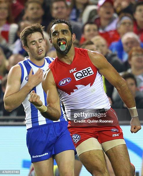 Adam Goodes of the Swans celebrates after kicking a goal during the round 11 AFL match between the North Melbourne Kangaroos and the Sydney Swans at...