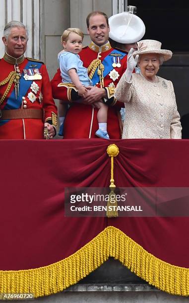 Britain's Queen Elizabeth II waves next to from the balcony of Buckingham Palace with her son Prince Charles, Prince of Wales, her gandson Prince...