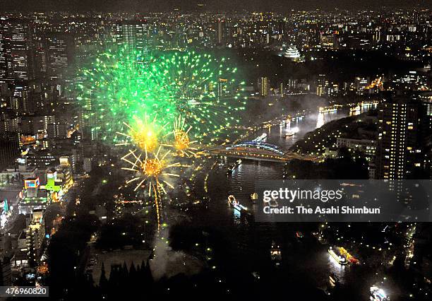 Tenjin Images In this aerial image, fireworks explode during the Tenjin Festival on ...