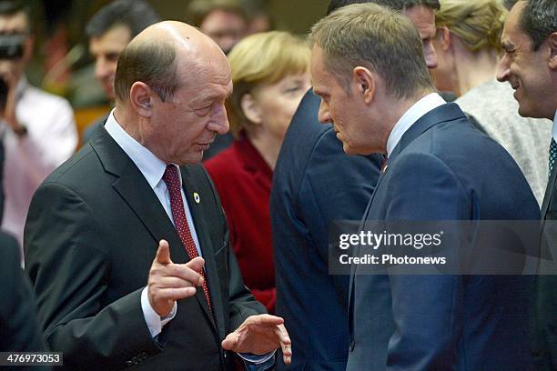 Traian Basescu, President of Romania and Donald Tusk, Prime Minister of Poland speak during a meeting to discuss the situation in Ukraine at the...