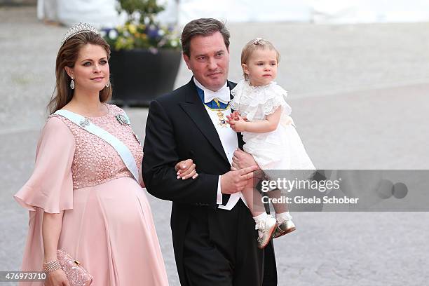 Princess Madeleine of Sweden, her husband Christopher O'Neill and their daughter Princess Leonore attend the royal wedding of Prince Carl Philip of...