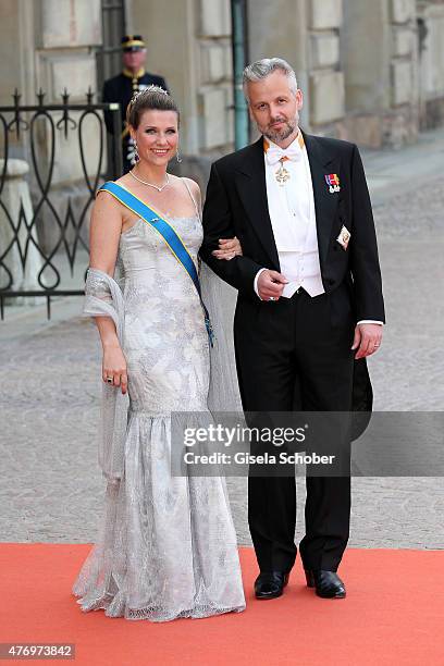 Princess Martha Louise of Norway and husband Ari Behn attend the royal wedding of Prince Carl Philip of Sweden and Sofia Hellqvist at The Royal...