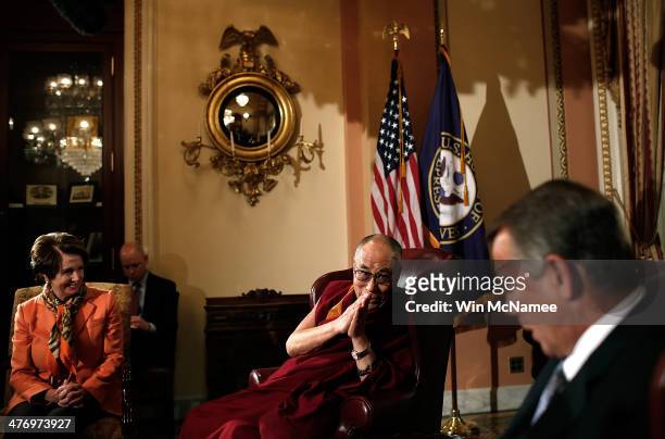 The Dalai Lama meets with U.S. Speaker of the House John Boehner and House Minority Leader Nancy Pelosi at the U.S. Capitol March 6, 2014 in...