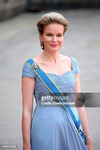 Queen Mathilde of Belgium attends the royal wedding of Prince Carl Philip of Sweden and Sofia Hellqvist at The Royal Palace on June 13, 2015 in...